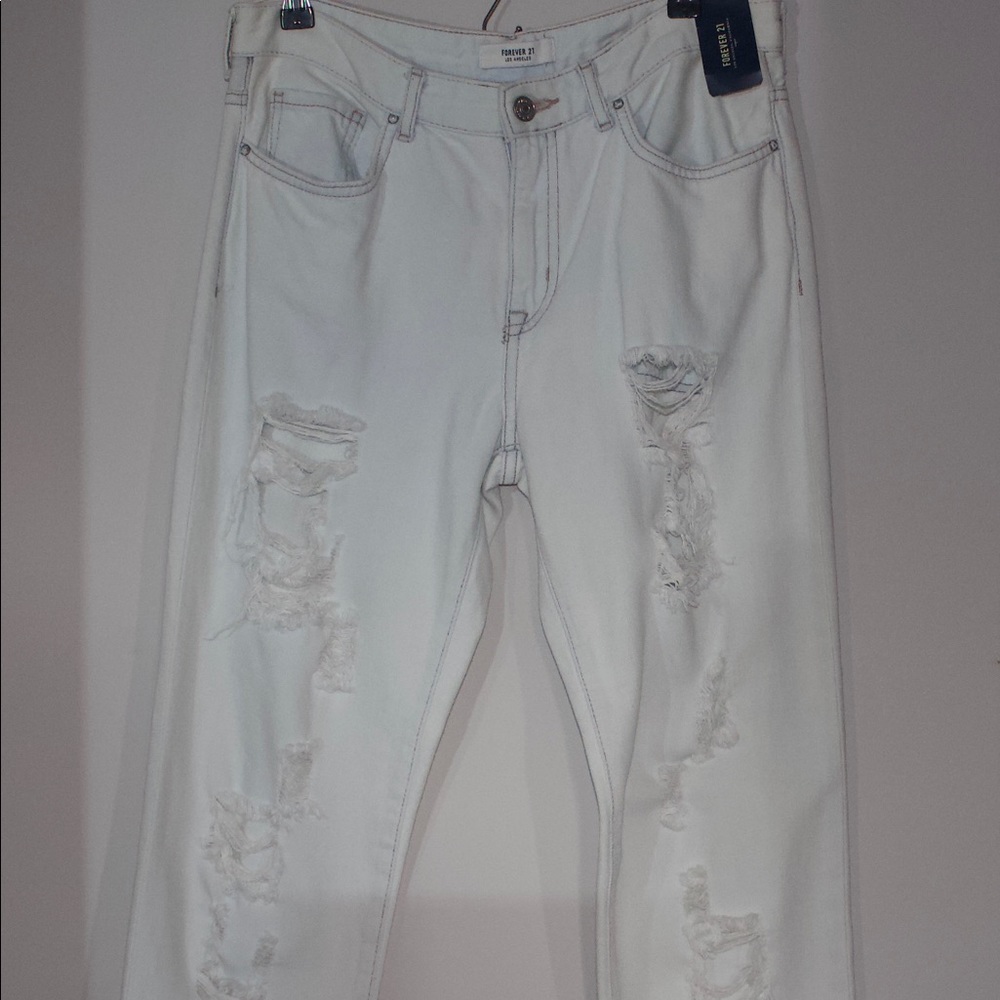 Ripped acid wash jeans